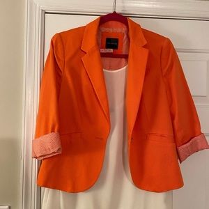 Bright orange blazer